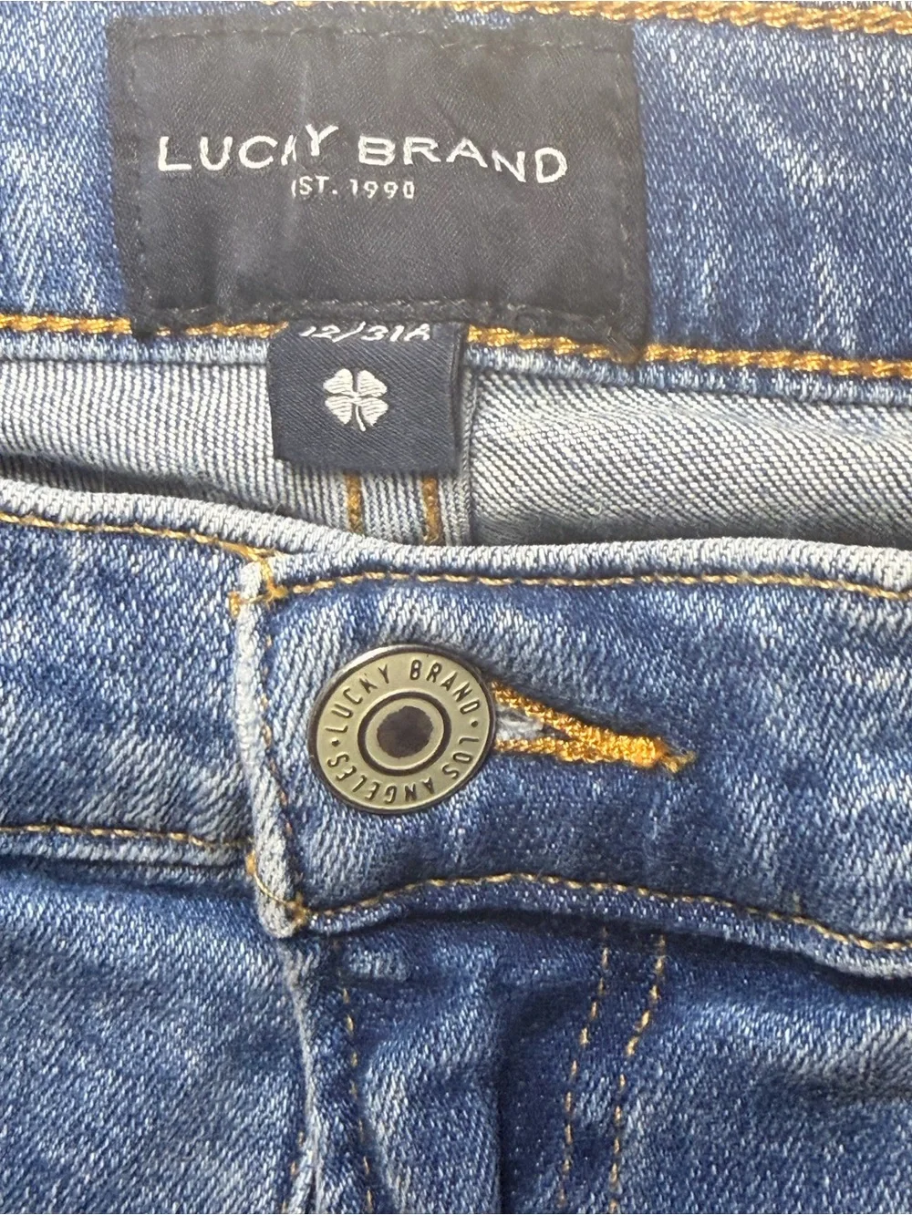 Lucky Brand Straight Leg Jeans in Washed Blue size 12